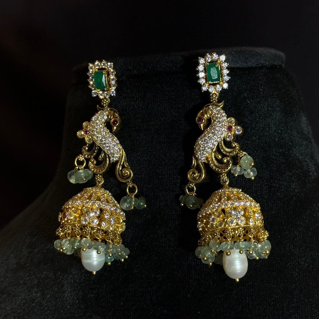 Elegant Peacock Jhumka Earrings in High-Polish Silver